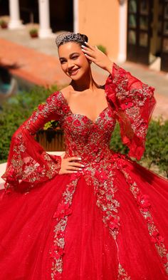 Wow the crowd in this red quinceañera dress with bell sleeves. This showstopping red quince dress comes with all the bells and whistles, from bead and stone-embellished embroidered lace to vibrant 3-D flowers. The sweetheart bodice of this open-back quince dress boasts a lace-up feature that adjusts for a comfortable fit. Embellished sheer bell sleeves add feminine flair, and the layered poofy skirt is sure to have your guests swooning. Celebrate your milestone fiesta in glamorous style when you Red Quince Dress, Red Quinceanera Dress, Poofy Skirt, Quinceanera Dresses Pink, Quince Dress, Unique Prom Dresses, Quinceanera Dress, Frill Sleeves, Glamorous Style