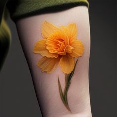 a yellow flower is on the arm of a woman's left leg and it has green stems