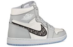 Dubbed “the most luxurious Air Jordan 1 ever”, all 8500 pairs of available Air Diors were made entirely in Italy with the finest materials and craftsmanship. The upper is constructed with white and Dior grey leather, where oblique monogrammed Swooshes enhances the opulent look. Underfoot, an translucent icy outsole completes the design. Air Dior, Men Dior, Jordan 1 High Og, Air Jordan 1 High, Jordan 1 High, Air Jordan 1 Mid, Jordan 1 Mid, Jordan 1 Retro High, Jordan 1 Retro