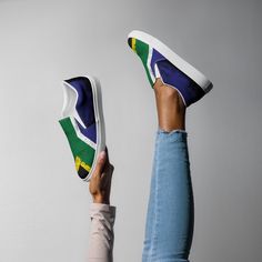 Elevate your style and showcase your South African pride with Be Lekker Co's South African flag SLIP-ON canvas shoes! These unique sneakers are a blend of fashion and patriotism, featuring the vibrant colours of the South African flag that's sure to turn heads wherever you go. Crafted with quality and comfort in mind, our high tops are perfect for any occasion - from casual outings to showing your support during sports events. Step into a world of style with a touch of South African spirit, and Canvas Slip-on Sneakers For Summer Streetwear, Slip-on Canvas Shoes For Streetwear With White Sole, Multicolor Slip-on Sneakers For Streetwear, Trendy Custom Slip-on Sneakers With Vulcanized Sole, Trendy Slip-on Custom Sneakers With Vulcanized Sole, Trendy Slip-on Sneakers For Streetwear, Multicolor Canvas Slip-on Shoes, Multicolor Slip-on Canvas Shoes, South African Flag