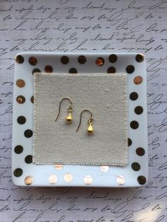 Gold Teardrop Earrings. These dainty teardrops are matte gold vermeil with gold filled French ear wires. These are the perfect minimal, dainty earrings for every day. Your earrings will arrive in a gift box. If this is a gift, I would be happy to include a card with your personal message - just let me know in the message section at checkout. Gold Drop Earrings Gift Set, Gold Drop Earrings As Gift With Matching Set, Teardrop Earrings With French Hook For Gift, Minimalist Teardrop Earrings With French Hook As Gift, Teardrop Pendant Earrings With French Hook For Gift, Teardrop Pendant Earrings For Gift, Gold Pear-shaped Teardrop Earrings As Gift, Dainty Teardrop French Hook Earrings, Gold Pear-shaped Teardrop Earrings For Gift