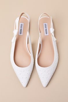 Make any day ultra-chic with the Steve Madden Olsen-P Pearl Knotted Pointed-Toe Slingback Flats! Gleaming, faux pearl studs cover soft woven fabric as it shapes a pointed-toe upper and a low-cut collar. The wide slingback strap boasts a cute, knotted detail at the outstep (and a bit of elastic at the instep for fit). 0. 25" rubber heel. Cushioned insole. Felted rubber sole has nonskid markings. Man Made Materials. Imported. Lulus | Olsen-P Pearl Knotted Pointed-Toe Slingback Flats | Size 6.5. Wedding Dress And Flats, Flats With Wedding Dress, White Wedding Flats, Low White Heels, Wedding Shoes Flats For Bride, White Pearl Heels, Flat Wedding Shoes For Bride, Ingenue Essence, Winter Flats