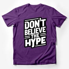 Make a statement with this eye-catching 'Don't Believe The Hype' T-shirt. This bold graphic shirt is not just a piece of clothing, but a form of self-expression. Perfect for those who like to stand out from the crowd, it features a snappy slogan that's sure to start conversations. Ideal for casual outings, this unisex tee fits comfortably and looks great with jeans or shorts. Made from quality materials, it ensures durability and comfort. Whether you're treating yourself or looking for a unique Purple Slogan T-shirt With Crew Neck, Purple Slogan T-shirt With Short Sleeves, Purple Graphic Tee With Graphic Design, Purple Crew Neck T-shirt With Text Print, Purple Graphic Print T-shirt Crew Neck, Graphic Purple T-shirt With Graphic Print, Purple Graphic Tee With Graphic Print, Graphic Print Purple T-shirt, Purple Graphic Crew Neck Top