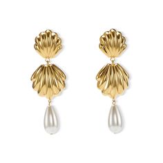 Channel your inner coastal goddess with our Serena Pearl Earrings. These stunning seashell drop earrings feature a teardrop pearl, adding a touch of elegance to your look. Hypoallergenic and carefully crafted, these earrings are both stylish and gentle on your skin. Elevate your style with these luxurious and exclusive earrings. Made in NYC. Shell-shaped Pearl Earrings For Wedding, Pearl Shell-shaped Earrings For Wedding, Elegant Shell-shaped Pearl Earrings, Pearl Shell-shaped Wedding Earrings, Elegant Shell-shaped Pearl Earrings For Wedding, Wedding Pearl Drop Earrings In Shell Shape, Elegant Shell-shaped Wedding Earrings, Elegant White Shell Pearl Earrings, Elegant Gold Shell Pearl Earrings