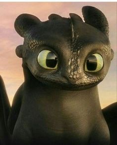 a close up of a toothless dragon with big eyes