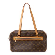 This is an authentic LOUIS VUITTON Monogram Cite GM. This chic shoulder bag is expertly crafted of classic Louis Vuitton monogram coated canvas. The bag features vachetta cowhide leather shoulder straps and trims with a front zipper pocket and polished brass hardware. The top zipper opens to an ivory microfiber interior with zipper and patch pockets. Classic Monogram Canvas Shoulder Bag With Adjustable Strap, Classic Shoulder Bag With Adjustable Strap In Monogram Canvas, Business Shoulder Bag In Monogram Canvas With Leather Trim, Elegant Monogram Canvas Shoulder Bag With Adjustable Strap, Luxury Monogram Canvas Shoulder Bag For Office, Designer Monogram Canvas Shoulder Bag For Business, Classic Shoulder Bag With Leather Trim And Monogram Canvas, Formal Shoulder Bag With Detachable Strap In Monogram Canvas, Formal Monogram Canvas Shoulder Bag With Detachable Strap