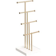 a gold metal rack with three bars on top and two other poles attached to it