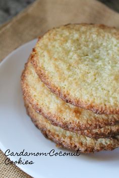 two cookies sitting on top of a white plate