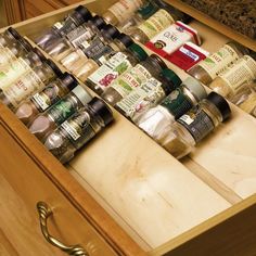 an open drawer filled with lots of different types of food and condiments on it