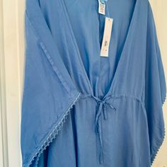 Nwt Draper James Rsvp Sz Small Caftan With Batwings In Iris Retail Price $68 - Full Coverage - Smooth Knit Construction - Straight Hem - No Closure - Pull-On Styling - Batwing Sleeves, Short Sleeves - Partially Lined - V-Neck - Fresh From The Reese Witherspoon Collection, Draper James Rsvp Caftan Coverup - Light Blue, Perfect For Complementing Your Swimwear - Size Small The Ideal Throw-On For Beach Days Or Poolside Relaxation - Made From 100% Modal, Ensuring A Soft And Airy Feel Blue V-neck Sleepwear For Vacation, Blue Bohemian Sleepwear For Vacation, Bohemian Blue Sleepwear For Vacation, Blue Summer Kimono For Loungewear, Blue Casual Kaftan For Loungewear, Blue V-neck Cover-up For Loungewear, Blue Summer Sleepwear With Kimono Sleeves, Blue V-neck Kaftan For Loungewear, Blue Sleepwear With Kimono Sleeves For Summer