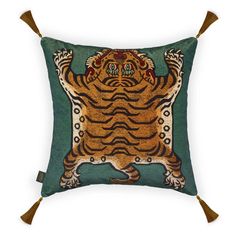 a decorative pillow with an image of a tiger on it