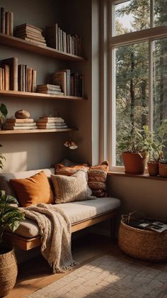 a living room filled with lots of books and plants