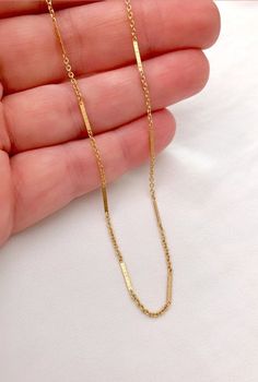 14k Gold Filled Flattened Bar Chain Necklace --- International Customers: Please be familiar with your country's policies in regards to customs fees prior to purchasing overseas. Any fees/taxes are the buyer's responsibility and may be charged at the time of delivery/pick-up. This is not included in the costs here. Thank you! This dainty, gold necklace is the piece of jewelry you can reach for on any occasion! Very subtle, yet eye catching! Features a 14k gold filled chain with a unique chain li Minimalist Necklace With Rectangular Links Gift, Rectangular Links Clavicle Chain Jewelry For Gift, Simple Cable Chain Jewelry Gift, Minimalist Rectangular Link Necklace As Gift, Simple Cable Chain Jewelry As Gift, Clavicle Chain Jewelry With Rectangular Links As A Gift, Simple Paperclip Chain Necklace As Gift, Simple Paperclip Chain Necklace Gift, Dainty Bar Necklace With Cable Chain For Gift