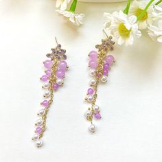 🍀 Size: 8.3x1.4 cm 🍀 Material: Sterling Silver Stud, Brass, Resin (✨Hypoallergenic Hook✨) Description 🌸 Elevate your style with our Wisteria Long Dangle and Drop Earrings, reminiscent of a blooming garden. These Flower Earrings capture the essence of Cottagecore aesthetics, radiating delicate charm.🌸 ⭐️ Shop more styles at https://etsy.com/uk/shop/StrawberryAtoll. ⭐️ * Shipping *  🇬🇧 Free shipping for UK orders.  * Packaging & Gift Wrap * 🎀 All our products are packaged with care and atte Fairycore Jewelry With Matching Earrings For Gift, Handmade Dangle Earrings In Fairycore Style, Fairycore Pink Earrings For Gifts, Fairycore Drop Earrings, Kawaii Pink Dangle Earrings, Cottagecore Earrings, Unboxing Experience, Rich Life, Delicate Earrings