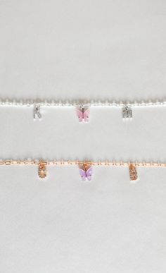 "A dainty personalized necklace featuring a colorful butterfly charm in between two crystal initials. Choose from peachy pink, turquoise blue, fuchsia pink, yellow, lavender, white, emerald green, ruby red, royal blue, jet black, and charcoal. Matching earrings: https://www.etsy.com/listing/693774042/colored-mariposa-butterfly-earrings-18k ✧ 1 gold plated necklace ✧ chain: 4mm curb (picture 2 & 5) or 3mm rolo (picture 1 & 4) ✧ lobster clasp closure ✧ nickel + lead free ✧ length: 16\"/40. Pink Personalized Dangle Necklaces, Pink Dainty Jewelry For Personalized Gifts, Dainty Pink Jewelry For Personalized Gift, Personalized Pink Necklace, Personalized Adjustable Butterfly Jewelry, Trendy Pink Butterfly Necklace Gift, Trendy Pink Butterfly Necklace For Gift, Delicate Personalized Pink Jewelry, Cute Pink Necklaces With Butterfly Charm