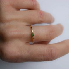 Natural Emerald-Pearl Dainty Ring, May Birthstone, Green Stone Ring, Pearl Ring, Birthday Gift Ring, Promise Ring, Gold Ring, Gift Ring Item Detail Material : 14K Gold , Stone Metal : 14K Solid Gold  Stone : Emerald & Pearl Size : 3mm & 2mm Shape: Round  Finish : 14k Yellow gold , 14k Rose gold , 14k White gold  Occasion:- Christmas Gift Ring, Mother's Day Gift, Valentine's Day Gift Ring, Lover gift Ring, Heart gift Ring, Promise Ring, Proposal Ring, Couple's Gift Ring, Anniversary Gifts Quality:- very order is processed timely and workmanship for each piece is done the best, because we believe customer's trust is worth our business. "The best way to predict the future is to create it" Contact Us:- Please Feel Free to contact us 24*7 to discuss for any order Express Shipping If you want ex Fine Jewelry Pearl Ring With Birthstone For Anniversary, Dainty Pearl Birthstone Ring For Anniversary, Dainty Pearl Promise Ring With Birthstone, Dainty Pearl Birthstone Promise Ring, Open Pearl Ring With Birthstone For Promise, Pearl Birthstone Open Ring For Promise, Pearl Stackable Rings For Anniversary, Pearl Birthstone Open Ring, Fine Jewelry Pearl Ring With Birthstone