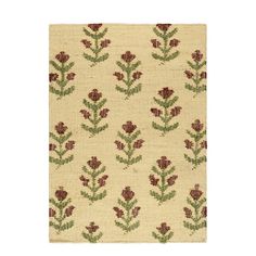 a beige rug with red and green flowers on the bottom, in front of a white background