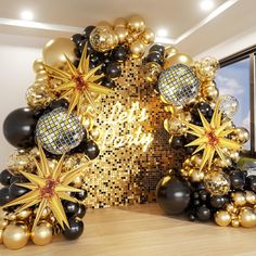 black and gold balloons are arranged in the shape of stars