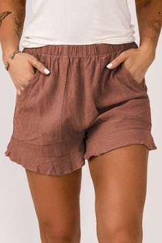 Rust Red Linen Cotton Pocketed Flutter Shorts Red Ruffled Shorts, Chic Ruffled Solid Color Shorts, Solid Ruffled Bottoms For Vacation, Brown Ruffled Bottoms For Spring, Spring Brown Ruffled Bottoms, Summer Bottoms With Ruffles, Summer Bottoms With Solid Color And Ruffles, Summer Ruffled Bottoms Solid Color, Red Ruffled Bottoms For Summer