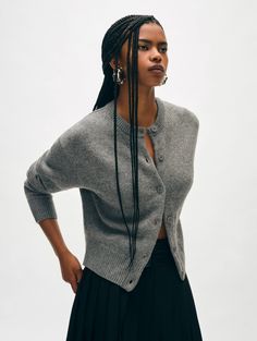 An integral part of every modern wardrobe, this cardigan is crafted from merino wool infused with cashmere for added softness. An array of considered details include a crew neckline, tonal buttons, and ribbed trims. A relaxed fit allows for easy layering over shirts and tees alike. Details Relaxed fit. Long sleeve. Length in size small is 21". The model is 5'10 1/2" and is wearing a size small. 70% Wool, 30% Cashmere. Dry clean only. Style #20982 Cashmere Crew Neck Sweater With Buttons, Crew Neck Cashmere Sweater With Buttons, Cashmere Crew Neck Sweater With Button Closure, Crew Neck Cashmere Sweater With Button Closure, Everyday Cashmere Cardigan With Buttons, Everyday Cashmere Cardigan, Cashmere Button Sweater For Layering, Cashmere Sweater With Buttons For Layering, Wool Cardigan With Button Cuffs For Layering