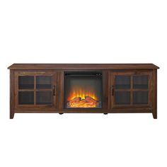 an entertainment center with a fireplace and glass doors on the front, in dark wood