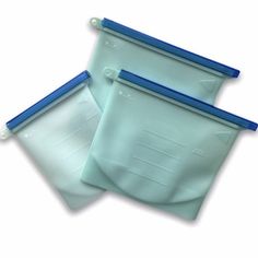 two plastic bags with blue handles on white background