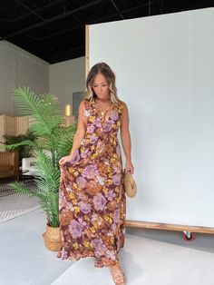 Details Deep V-Neckline Floral Maxi Dress with Chest Strings and Open Side Detailing Lined Color: Brown Multi Material: 100% Polyester Size Runs True to Size Model is Wearing a Size Small Model Measurements Size: 4 Height: 5'2" Weight: 135lbs Bust: 35" Waist: 26" Hips: 35" Bra Size: 34C Boho Pants, Sweatpants Shorts, Fall Floral, Floral Maxi, Cropped Tank Top, Floral Maxi Dress, Model Measurements, Jumpsuit Dress, Denim Skirt