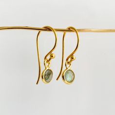 Add some subtle but noticeable color to your everyday look with these exquisite Bezel Gemstone Drop Earrings! Featuring petite faceted gemstones bezel-set and suspended from gold-filled ear wires, you can find the perfect birthstone for you or someone special in the twelve birthstones of the year. An ideal personalized gift for any occasion! -- bezel charm: 6mm French hook ear wires 14k gold filled Dainty Faceted Everyday Earrings, Gold Dangle Earrings With Bezel Setting, Gold Bezel-set Dangle Earrings, Dainty Faceted Yellow Gold Earrings, Everyday Gold Gemstone Earrings, Delicate Faceted Gold Earrings, Dainty Gold Birthstone Earrings, Dainty Earrings With Bezel Setting For Gift, Dainty Bezel Set Earrings For Gift