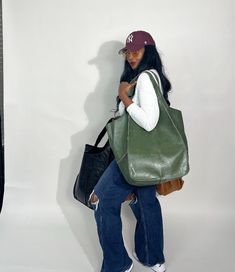 Our Fall oversized vegan tote is the perfect conversation tote for travel or everyday use as it has multiple pockets with an attention to detail with all the fall hues. Tote can be cinched int middle for an hour glass look or work oversized. Available in 4 corlors: Black , Cognac, Camel and Hunter Green. These are truly statement bags! Winter Kimono, Statement Bags, Summer Kimono, Vegan Leather Tote, Hour Glass, Statement Bag, Plus Size Summer, Kaftan Dress, End Of Summer