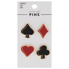 three pins with playing cards and hearts on the front, one in red and one in black