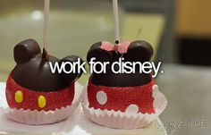 two mickey mouse cupcakes with candles in the shape of minnie's ears