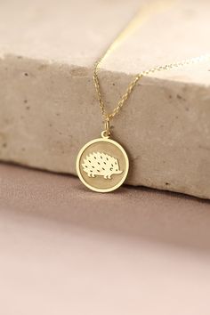 Gold Hedgehog Pendant - Porcupine Gold Necklace ● Material of pendant: Solid Gold 14k ( REAL GOLD ) ● Metal Stamp: 14k ( REAL GOLD ) ● The pendant is available in 5 sizes: - 12,7 mm / 0.5 inches (Diameter) - 14,0 mm / 0,55 inches ( Diameter ) In the photos - 15,3 mm / 0.6 inches ( Diameter ) - 16,5 mm / 0,65 inches ( Diameter ) - 19,1 mm / 0,75 inches ( Diameter ) ( In the photos the size is 14mm / 0.55 inches Diameter ) ( Jump Ring inner diameter: 4 mm ) ● Material of chain: Solid gold 14k ( RE Necklace For Kids, Animal Necklace, 14k Gold Necklace, Pet Necklace, Amulets, Metal Stamping, Real Gold, Gold Pendant, Gold Chains