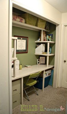 a room with a desk and shelves in it