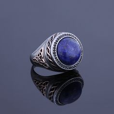 Lapis lazuli, is a deep-blue metamorphic rock used as a semi-precious stone that has been prized since antiquity for its intense color. Its deep, celestial blue remains the symbol of royalty and power, spirit and vision. It helps support spiritual enlightenment by allowing you to go deeper within your Soul. Men's Lapis Lazuli gemstone signet ring which will give you a head turning presence. This mystic, vintage style, engraved ring has a unique design for the polished, refined, and distinguished Silver Celtic Rings, Celtic Ring, Celestial Blue, Engraved Ring, Celtic Rings, Medieval Jewelry, Lapis Lazuli Ring, Ring Birthstone, Spiritual Enlightenment