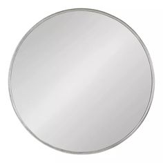 a round mirror on a white background