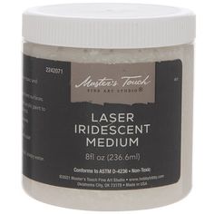 a jar of white colored paint with the words laser iridescent medium on it