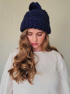 A dark blue hand-knit beanie that's the perfect autumn or winter accessory.  It's made with high quality thick yarn, making this a squishable, chunky, cozy hat. It's the perfect accessory for fall campfires, camping, hiking, or everyday outdoor activity. It has quite a bit of stretch and will fit comfortably on any adult size head. Note: Colors are photographed as accurately as possible. However, please allow for differences due to monitor settings and camera quality. This product was created in a smoke free, pet free home. Hand wash and lay flat to dry. Blue Soft Knit Beanie For Fall, Blue Soft Knit Hat For Fall, Blue Knitted Hat For Fall, Blue Knitted Fall Hats, Winter Blue Hand Knitted Beanie, Blue Hand Knitted Beanie For Winter, Cozy Blue Yarn Hats, Blue Knitted Winter Beanie, Knitted Blue Beanie For Fall