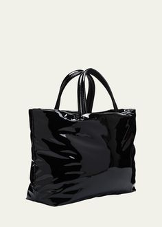 "Find SAINT LAURENT Patent Leather Maxi Tote Bag on Editorialist. Saint Laurent tote bag in patent leather (polyurethane/polyester) Embossed logo at front Two top carry handles; drop 7.9\" Inner, one zip pocket Approx. 24.4\"L x 17.3\"H x 7.9\"D Made in Italy" Designer Black Bags With Glossy Finish, Luxury Black Patent Leather Bag, Glossy Finish Top Handle Shoulder Bag, Designer Patent Leather Bag With Glossy Finish, Evening Bags With Glossy Finish And Double Handle, Luxury Shoulder Bag With Glossy Finish And Double Handle, Glossy Finish Double Handle Evening Bags, Everyday Patent Leather Bag With Detachable Handle, Glossy Leather Double Handle Shoulder Bag