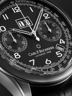 In its 130 years of watchmaking, Carl F. Bucherer has earned a reputation for precise mechanical engineering and timeless design. Demonstrating these exacting house codes, this 'Heritage BiCompax Annual' reference reimagines the original 1956 model with the addition of a practical annual calendar complication. It's been built in Switzerland from DLC-coated stainless steel and centred by a matte black dial featuring easy-to-read numerals and a tachymeter scale. The CFB 1972 in-house automatic mo… Timeless Black Watch With Date Display, Black Timeless Watch With Date Display, Classic Chronograph Watch With Date Display For Anniversary, Timeless Round Chronograph Watch With Date Indicator, Classic Black Watch With Date Display, Black Classic Watch With Date Display, Timeless Chronograph Watches For Anniversary, Timeless Tachymeter Watch For Anniversary, Formal Black Chronograph Watch With Date Display