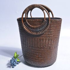 Our Larysa Bucket Bag is woven from straw and has a square shape with rounded handles. It is the perfect accessory for vacations or summer days in the city.Specs: Material: Straw Hollow Out Zipper closure Chic Woven Beach Bag With Round Handle, Straw Bag With Round Handle For Shopping, Straw Shopping Bag With Round Handle, Shopping Crochet Bag With Woven Round Handle, Shopping Crochet Bag With Round Handle, Crochet Shopping Bag With Round Handle, Bohemian Straw Bag With Bamboo Handle For Shopping, Trendy Woven Straw Bag With Round Handle, Chic Daily Use Straw Bag With Bamboo Handle