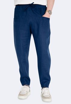 Meet your new go-to: Dark Blue Linen Joggers designed for both comfort and flair. Made from premium linen, these joggers are breathable and relaxed, perfect for any setting, casual or semi-formal. Stylish pockets add a dash of practicality and style, making these joggers a versatile staple for your wardrobe. Product Details: * Material: 100% Linen * Color: Dark Blue * Fit: Relaxed * Waistband: Elastic with drawstring * Pockets: Two front pockets * Care Instructions: Machine wash cold, tumble dry Navy Full Length Casual Bottoms, Casual Navy Straight Leg Bottoms, Blue Linen Pants With Tapered Leg, Casual Navy Long Pants, Navy Casual Long Pants, Casual Navy Tapered Leg Pants, Blue Linen Pants With Loose Fit, Navy Bottoms With Elastic Waistband, Blue Linen Bottoms With Elastic Waistband