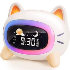 the alarm clock is shaped like a cat