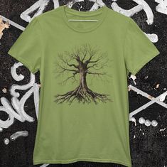 This image of a tree with its roots is printed on a Gildan 5000. The unisex heavy cotton tee is the basic staple of any wardrobe. It is the foundation upon which casual fashion grows. The specially spun fibers provide a smooth surface for premium printing vividity and sharpness. No side seams mean there are no itchy interruptions under the arms. The shoulders have tape for improved durability. .: 100% cotton (fiber content may vary for different colors) .: Medium fabric (5.3 oz/yd² (180 g/m .: Classic fit .: Tear-away label .: Runs true to size -Before leaving any negative feedback, please contact us so we can make it right -Please contact us with any questions or concerns -We do not accept refunds or exchanges but please contact us about any issues so we can make it right Shoulder tape: T Tree And Roots, Tree Tshirt, Gifts For Nature Lovers, Twill Tape, Negative Feedback, A Tree, Nature Lover, Cotton Fiber, Heavy Cotton