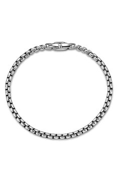 Medium-sized sterling-silver links bring understated shine to your ensemble with this gleaming box-chain bracelet masterfully crafted in the USA. 8" length Lobster clasp closure Sterling silver Made in the USA Everyday White Gold Sterling Silver Bracelet With Solid Link, Classic Sterling Silver Chain Link Bracelet, Classic Silver Cable Chain Bracelet, Classic Sterling Silver Bracelet With Silver Chain, Classic Sterling Silver Chain Bracelet With Solid Links, Timeless Sterling Silver Box Chain Bracelet, Classic Silver Chain Link Bracelet, Classic Sterling Silver Bracelet With Cable Chain, Timeless Silver Box Chain Bracelet