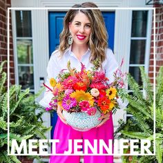 a woman holding a bowl full of flowers with the words meet jenny written on it