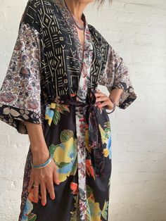 "This is super stylish kimono robe made patchwork of varieties silky materials  It is in free size with wrap tie closing, with smal splits on the side  easy fit all ladies, feels very comfortable and light  Can be used as an everyday robe or boho street style over all with jeans and t shirt  It is made one of a kind, patchwork from varieties of different floral silky materials  MEAESURE shoulder 17\" length 55\" MATERIAL *poliester, no lining CARE INSTRUCTIONS  * Wash in warm water * Hand wash r Stylish Kimono, Boho Street Style, Over Coat, Floral Patchwork, Long Kimono, Pajama Robe, Womens Robes, Dressing Gown, Urban Style