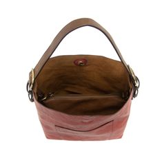 Description: Equally timeless and modern, our Classic Boho bag is made in rich vegan leather in a beautiful color and with neutral straps. This roomy bag accented with a large front pocket and a snap-in removable crossbody, has plenty of room to carry your needs in style!﻿ Main Bag: Dimensions: 12" H x 14" W x 6" D Adjustable strap drop: 6-11" Magnetic snag top closure Exterior open pocket Two snaps to attach insert to act as lining Brass plated hardware 100% vegan leather (polyurethane) Removab Classic Faux Leather Hobo Bag With Adjustable Strap, Crossbody Hobo Bag With Detachable Strap For Errands, Burgundy Shoulder Bag With Adjustable Strap For Errands, Faux Leather Crossbody Hobo Bag For Everyday Use, Faux Leather Hobo Bag With Double Handle, Faux Leather Satchel Hobo Bag With Detachable Strap, Faux Leather Hobo Bag With Adjustable Strap, Burgundy Bucket Shoulder Bag For Everyday, Red Faux Leather Satchel