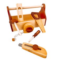 a wooden toy boat with tools in it