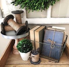 a table topped with lots of different types of items on top of a wooden shelf