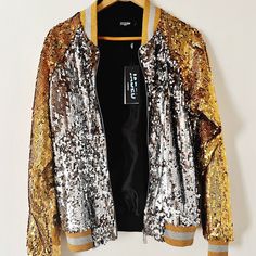 Jaded London Bomber Jacket Sequin Xs Bought Off Nasty Gal Website Years Ago, Along With Another Sequin Jacket With A Different Color Pattern, I Ended Up Reaching For The Other One, So This One Got Stored. Ready To Release It To Someone Who Will Wear It, And Live It’s Best Disco Life! Gold + Silver Sequin Jacket - Nwt Super Disco Babe Chic, With A Bit Of An Oversized Fit ;) A Wow + Real Glow Up Piece! Out Of Stock Online Smoke Free + Good Vibe Home Metallic Outerwear For Party, Casual Metallic Outerwear For Party, Winter Silver Sequined Outerwear, Silver Sequined Winter Outerwear, Silver Sequined Outerwear For Winter, Silver Sequined Outerwear For Fall, Patchwork Denim Jacket, Faux Leather Biker Jacket, Vegan Leather Jacket